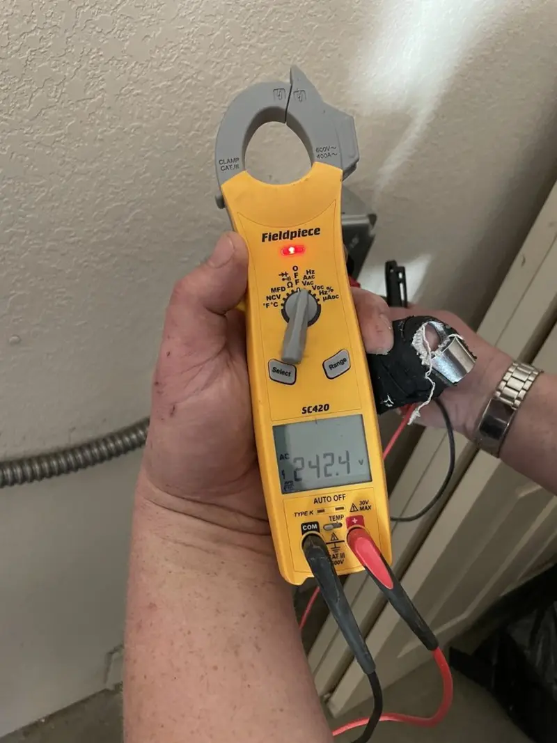 Voltage testing with clamp meter during Circuit Breaker Repair in Fairview